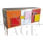 Three-door sideboard in colored glass with backlit handles