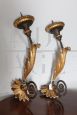 Pair of 18th century wall candle holders in painted and gilded wood 