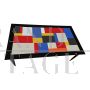 Design table in wood and multicolored glass