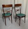 Pair of Melchiorre Bega chairs in green skai leather, 1950s