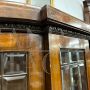 1940s art deco rounded display cabinet in inlaid oak with beveled glasses