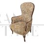 Pair of vintage wooden armchairs covered with floral fabric