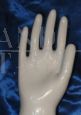 Glazed ceramic hand with crystal base