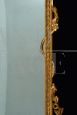 Antique Louis XV style mirror in gilded and carved wood, Tuscany early 1900s