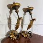 Pair of 18th century wall candle holders in painted and gilded wood