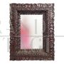 17th century mirror with richly carved wooden frame