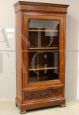 Antique Louis Philippe capuchin walnut display cabinet bookcase from the 19th century