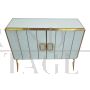 Design sideboard with two doors in white glass and brass