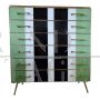 Small tallboy dresser with vertical lines in colored glass