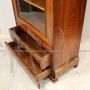 Antique Louis Philippe capuchin walnut display cabinet bookcase from the 19th century