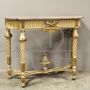 Antique Louis XVI console from the 19th century, carved, lacquered and gilded