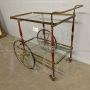 Cesare Lacca serving trolley in brass, glass and burgundy lacquered wood