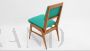 Set of 4 mid-century French dining chairs in green skai, 1950s