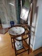 Vintage wash stand from the early 1900s with ceramic basin and jug