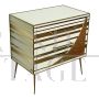 Three-drawer dresser with white and gold glass geometries