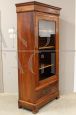 Antique Louis Philippe capuchin walnut display cabinet bookcase from the 19th century