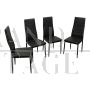 Set of 4 design chairs in black leather with high backrest                            