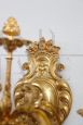 Pair of chiseled gilt bronze wall lights in antique style