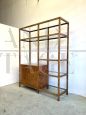 70s bookcase in briarwood and brass with glass shelves