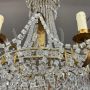 Early 1900s 8-light chandelier in gold metal with crystal drops