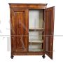 Antique wardrobe or pantry cabinet from the 19th century in walnut