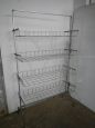 Vintage metal shop display shelving unit with wheels, 1960s