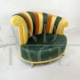 Pair of multicolored round design armchairs with asymmetrical backrest