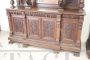 Imposing antique cupboard in carved solid walnut with mirror, 19th century