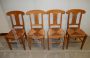 Set of 4 antique style honey walnut chairs with straw seat