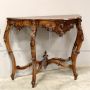 Antique Louis Philippe console table in richly carved walnut