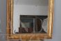 Large antique gilded mirror with a wavy shape