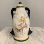 Futuristic 1930s majolica vase with ceramist figure