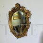 Small French oval mirror from the late 19th century in gilded wood