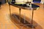 Black and gold oval coffee table, Italian design from the 70s