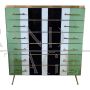 Small tallboy dresser with vertical lines in colored glass    