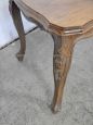 Vintage coffee table with wavy and carved legs