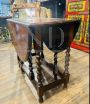 Antique drop-leaf Pembroke table with turned legs, 1910s - 1920s