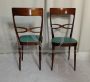 Pair of Melchiorre Bega chairs in green skai leather, 1950s