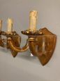 Pair of antique gilded candle-shaped wall lights from 19th century