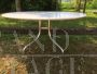 Shine oval table by Vico Magistretti for De Padova