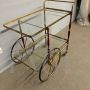 Cesare Lacca serving trolley in brass, glass and burgundy lacquered wood