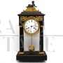 Antique pendulum clock from the Directoire period in gilded bronze and marble