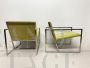 Minimalist design armchairs in metal and green fabric