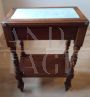 Antique inlaid coffee table with light blue velvet top