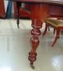 Antique English mahogany extendable dining table