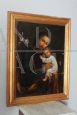 Antique painting depicting Saint Joseph with Child, oil on canvas from the 18th century