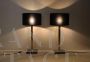 Pair of modern design lamps in brass and black marble