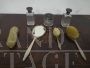 Antique toilet set with silver and tortoiseshell brushes, mirror and bottles