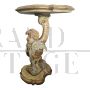 Pair of small antique style consoles carved with cherubs