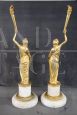 Pair of sculptural female figures in gilded bronze and alabaster